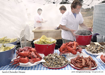 Sam's Chowder House Executive Chef Lewis Rossman prepares a Lobster Clambake on the property...